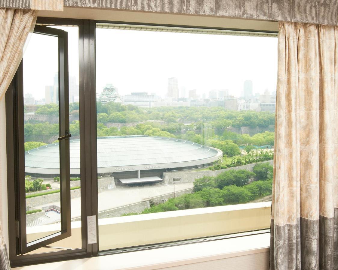 Hotel New Otani Осака Экстерьер фото View of the National Olympic Sports Centre from the hotel